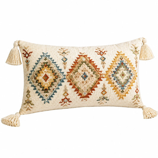 Coussin décoratif 50 x 30 cm tissu beige brodé style bohème avec pompons