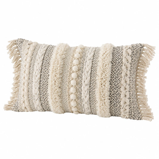 Coussin décoratif 50 x 30 cm en textile beige et gris à franges style bohème